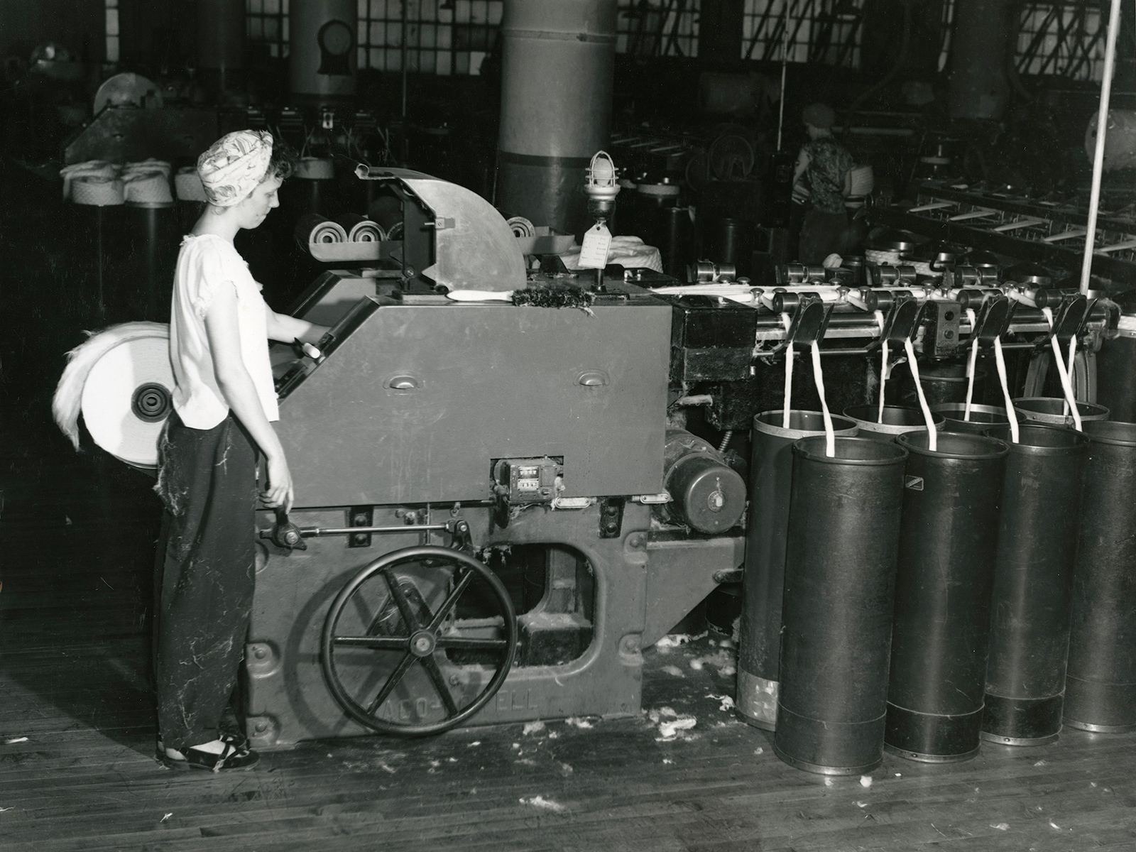Cleaning and straightening raw cotton at Canadian Cottons
